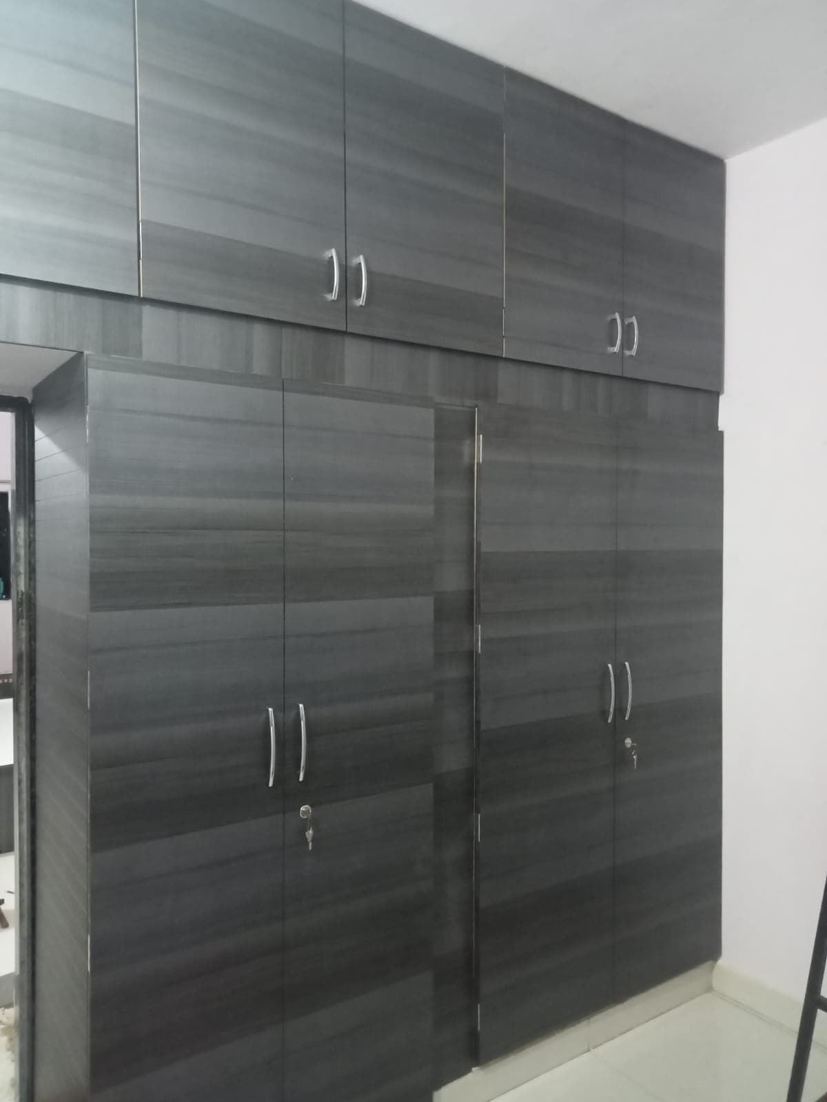 Expert carpentry work - custom closet built by MistriKaam carpenter in Ahmedabad