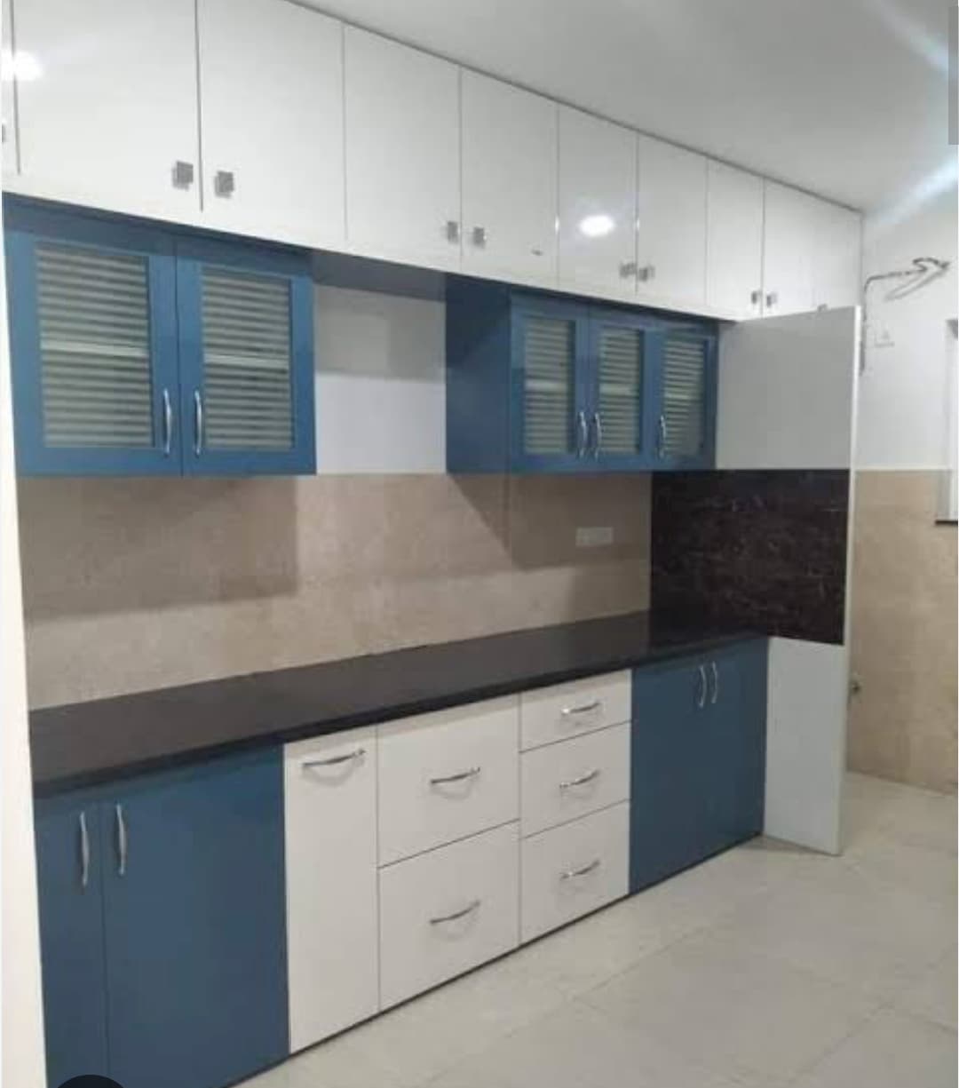 Modern modular kitchen design with premium finish in Ahmedabad